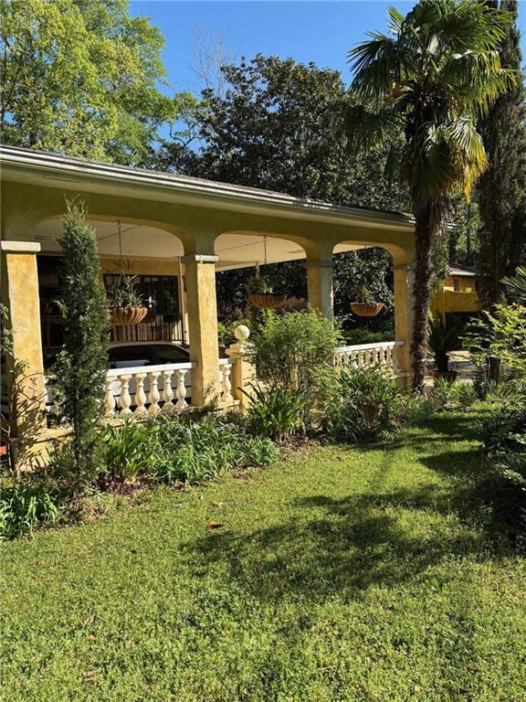 exterior space with a lawn