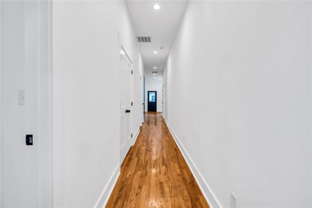 hall featuring hardwood / wood-style flooring