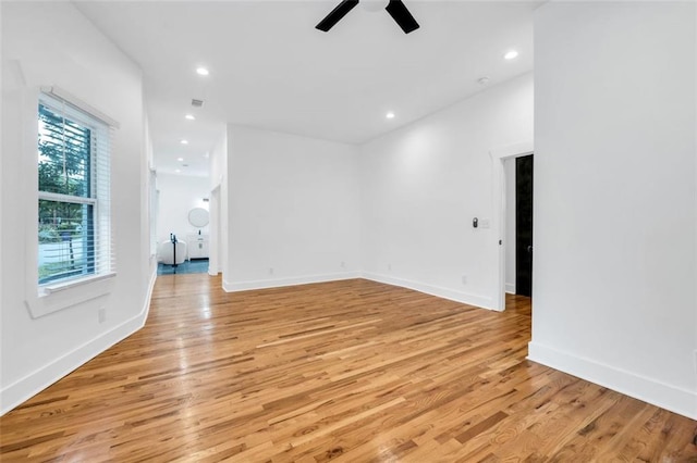 interior space with ceiling fan and light hardwood / wood-style flooring