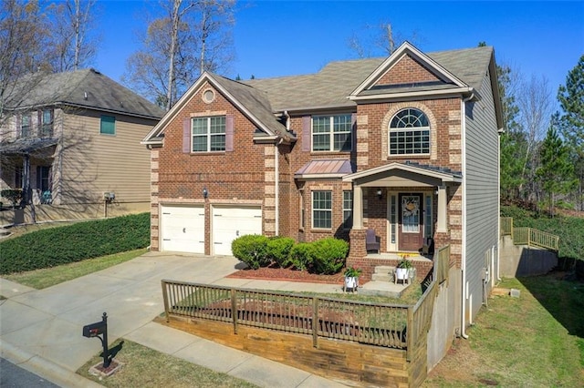 traditional-style home featuring brick siding, concrete driveway, a fenced front yard, an attached garage, and a porch