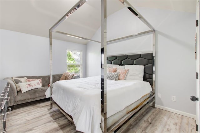 bedroom with wood finished floors