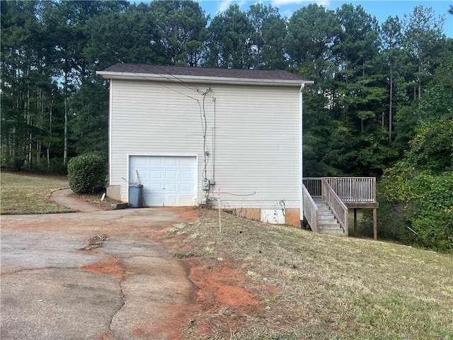 garage with a lawn