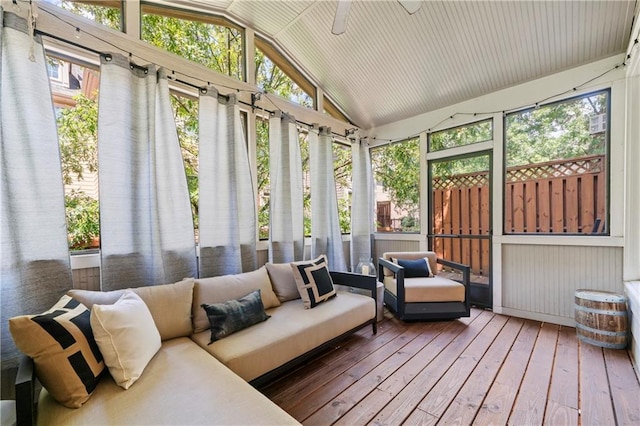 sunroom / solarium with lofted ceiling