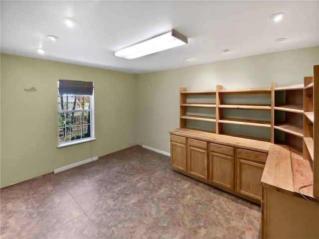interior space with baseboards