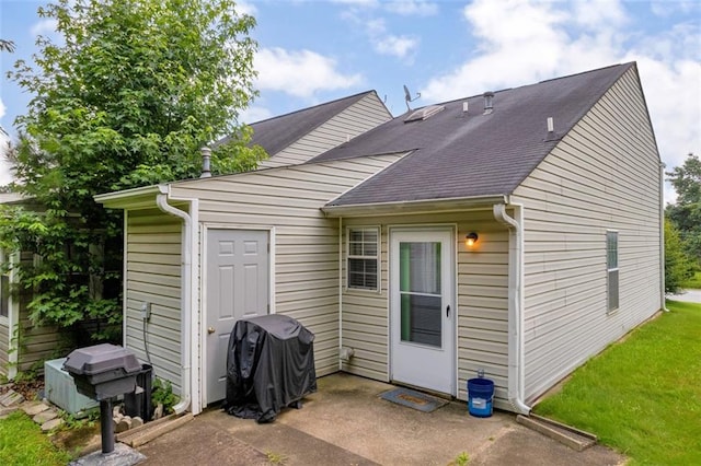6178 Field Stone Dr, Douglasville, GA 30134 - rear view of house with a patio area and roof with shingles