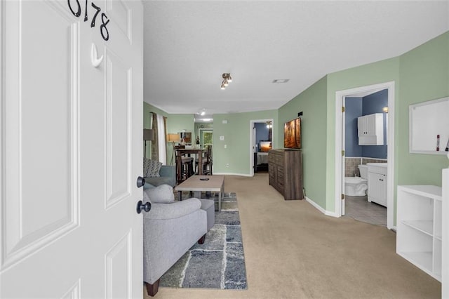 6178 Field Stone Dr, Douglasville, GA 30134 - living area with carpet and baseboards
