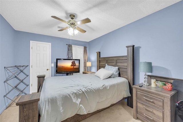 6178 Field Stone Dr, Douglasville, GA 30134 - bedroom featuring light carpet, ceiling fan, and a textured ceiling