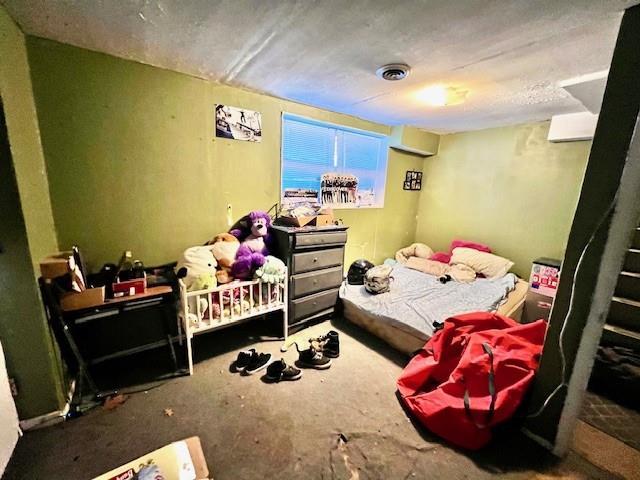 bedroom featuring visible vents