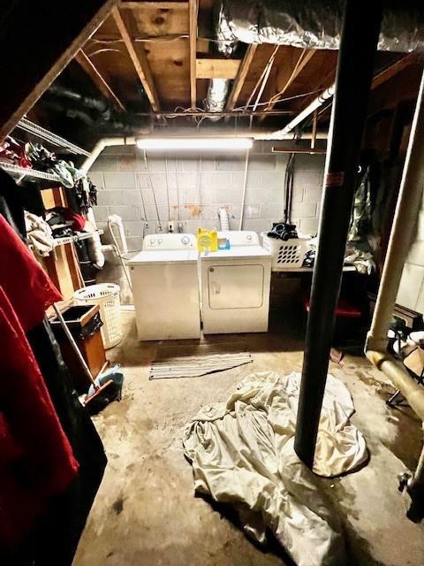 unfinished basement with independent washer and dryer