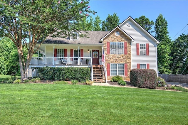 10 Alexandria Ln, Dallas, GA 30132 - tri-level home featuring stone siding, a front yard, covered porch, and stairway