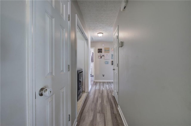 10 Alexandria Ln, Dallas, GA 30132 - corridor featuring a textured ceiling, wood finished floors, and washer / clothes dryer