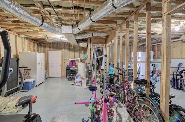 10 Alexandria Ln, Dallas, GA 30132 - basement with white fridge with ice dispenser