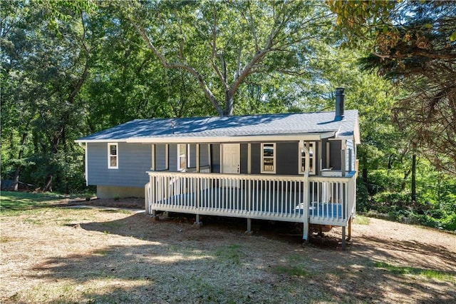 rear view of house with a deck