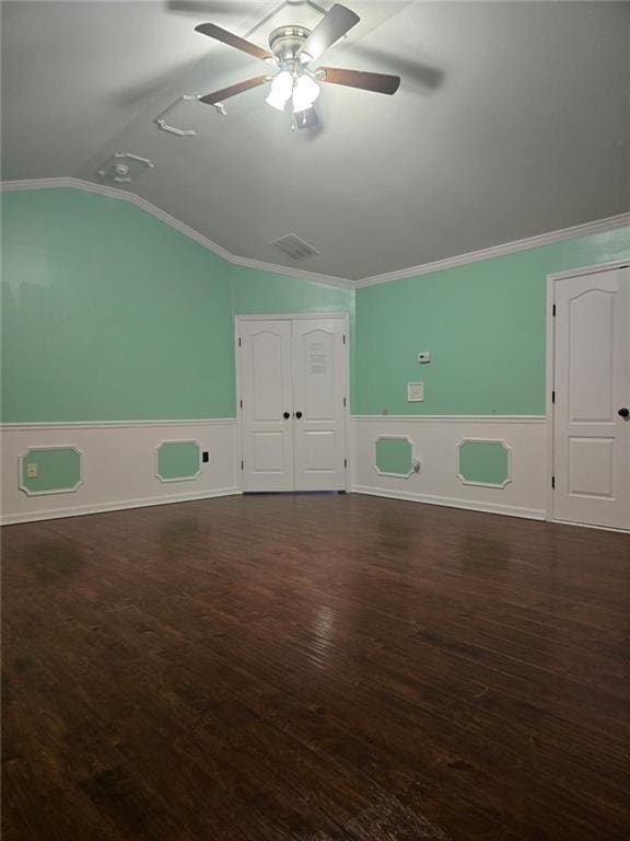 3770 Falling Leaf Ln, Cumming, GA 30041 - empty room featuring wainscoting, ceiling fan, lofted ceiling, wood finished floors, and crown molding