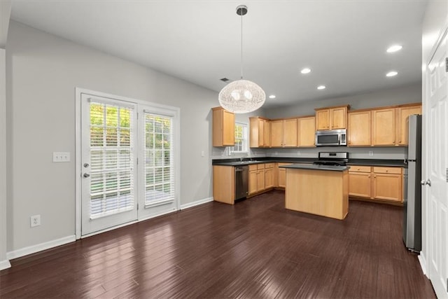 911 Queensbrooke Way, Mableton, GA 30126 - kitchen featuring stainless steel appliances, recessed lighting, dark wood finished floors, dark countertops, and a kitchen island