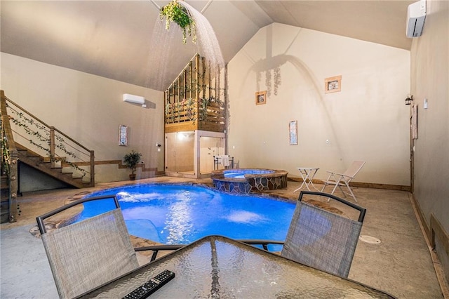 view of swimming pool with a wall mounted AC and a pool with connected hot tub