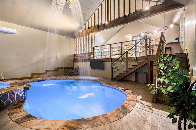 view of pool with an indoor in ground hot tub