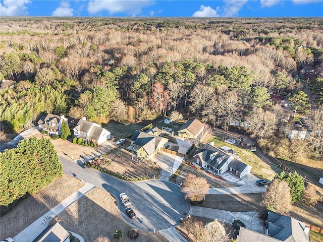 bird's eye view with a forest view