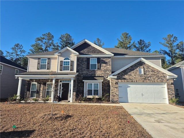 view of front of property with a garage