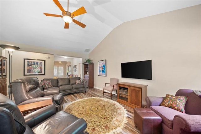 3633 Gilpin Ct, Lawrenceville, GA 30044 - living area featuring vaulted ceiling, wood finished floors, a ceiling fan, and baseboards