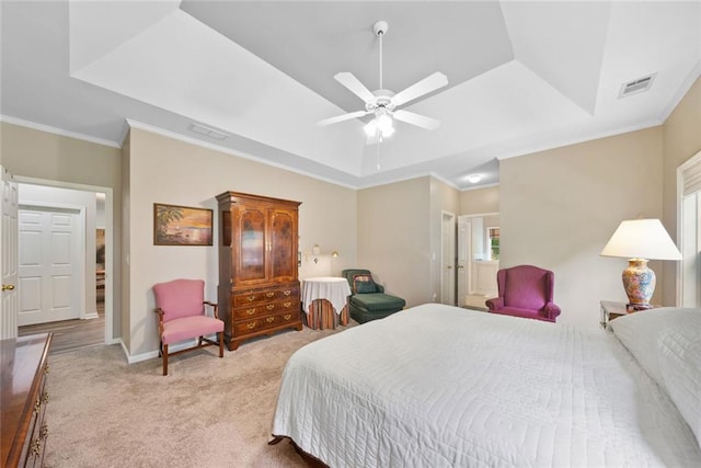 3633 Gilpin Ct, Lawrenceville, GA 30044 - bedroom with a raised ceiling, light colored carpet, crown molding, ceiling fan, and baseboards