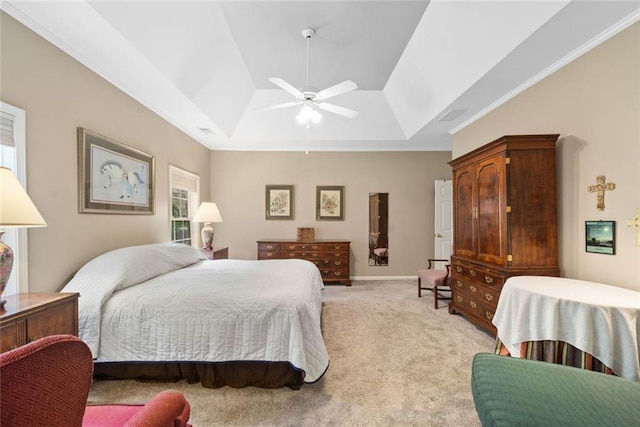 3633 Gilpin Ct, Lawrenceville, GA 30044 - bedroom with a raised ceiling, light colored carpet, lofted ceiling, ornamental molding, and a ceiling fan
