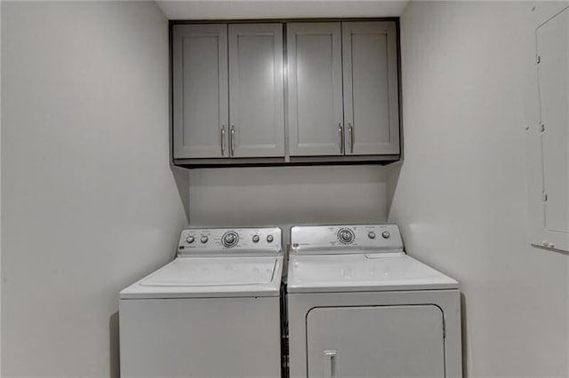 laundry room with cabinet space and washer and dryer