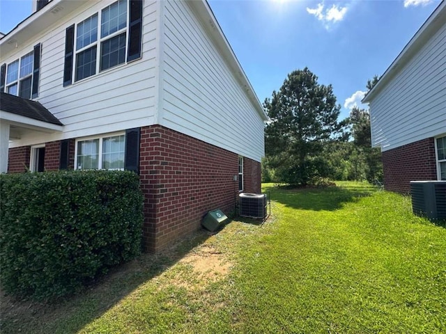 625 Mill Stone Blf Unit B, Monroe, GA 30655 - view of home's exterior with brick siding and a yard
