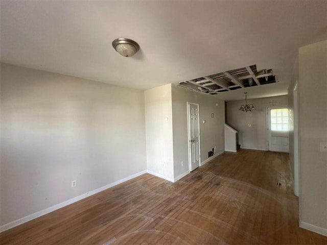 625 Mill Stone Blf Unit B, Monroe, GA 30655 - empty room with wood finished floors and baseboards