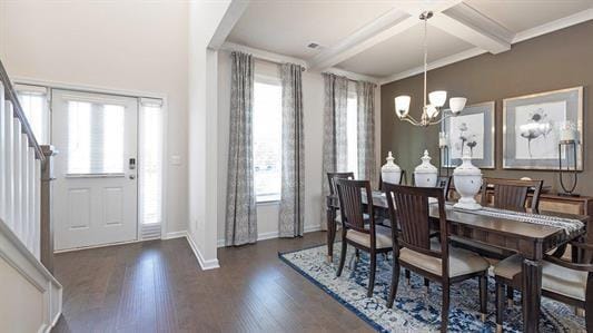 dining area featuring coffered ceiling, dark hardwood / wood-style floors, ornamental molding, a notable chandelier, and beam ceiling