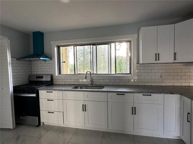 6774 Collier Rd, Riverdale, GA 30296 - kitchen with stainless steel range with gas stovetop, ventilation hood, a sink, decorative backsplash, and white cabinets