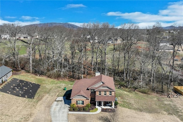 drone / aerial view featuring a mountain view