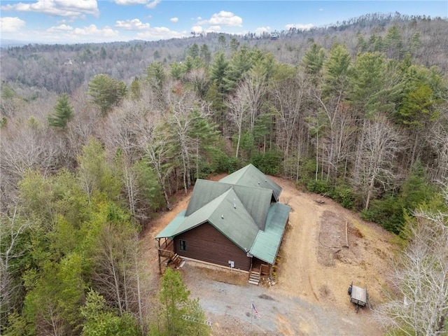 bird's eye view featuring a forest view