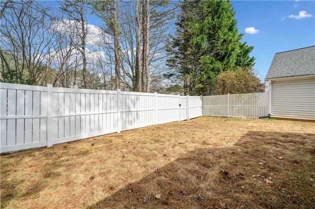 view of yard featuring a fenced backyard