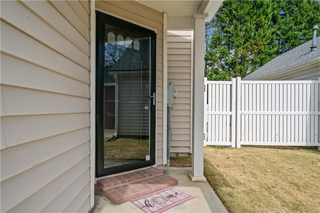 property entrance with fence