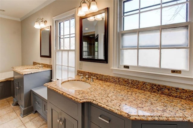 bathroom featuring crown molding, tile patterned floors, and vanity