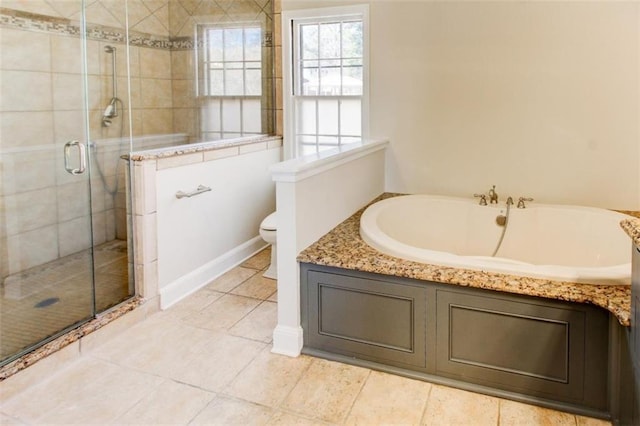 bathroom with toilet, independent shower and bath, and tile patterned flooring