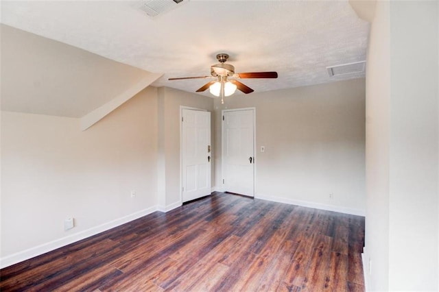 unfurnished room with dark hardwood / wood-style floors and ceiling fan