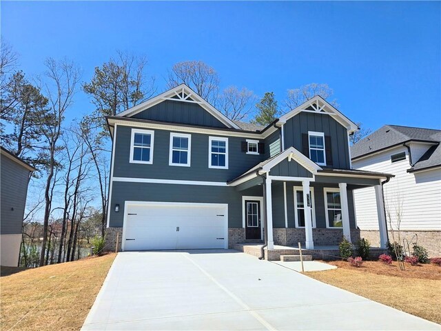 craftsman house with a garage and a porch