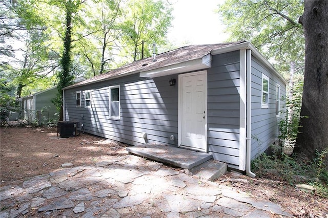 view of outdoor structure featuring central AC