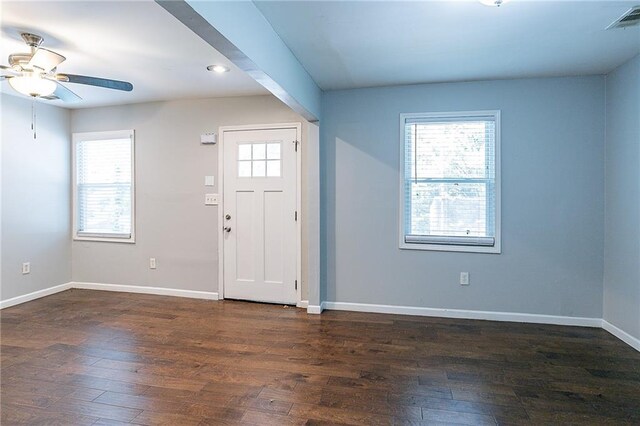 foyer entrance featuring ceiling fan and dark hardwood / wood-style floors