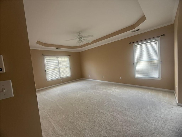 1919 Barrett Knoll Cir NW, Kennesaw, GA 30152 - empty room with a tray ceiling, baseboards, ceiling fan, ornamental molding, and light colored carpet
