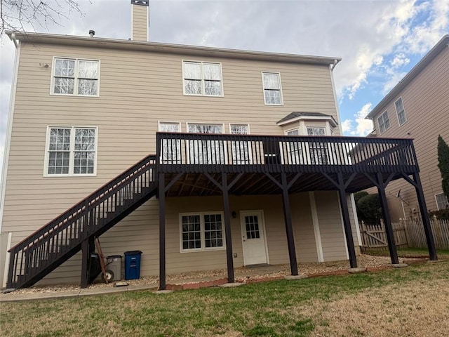 1919 Barrett Knoll Cir NW, Kennesaw, GA 30152 - back of house with a deck, stairway, and a chimney