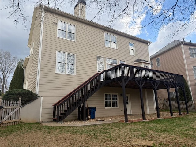 1919 Barrett Knoll Cir NW, Kennesaw, GA 30152 - back of house featuring stairs, a wooden deck, and a chimney