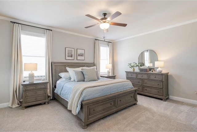 bedroom featuring light carpet, baseboards, ornamental molding, and ceiling fan