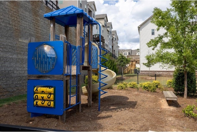 community jungle gym with fence