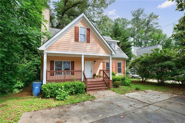 3135 Washington Rd, Atlanta, GA 30344 - bungalow-style home featuring covered porch and a chimney