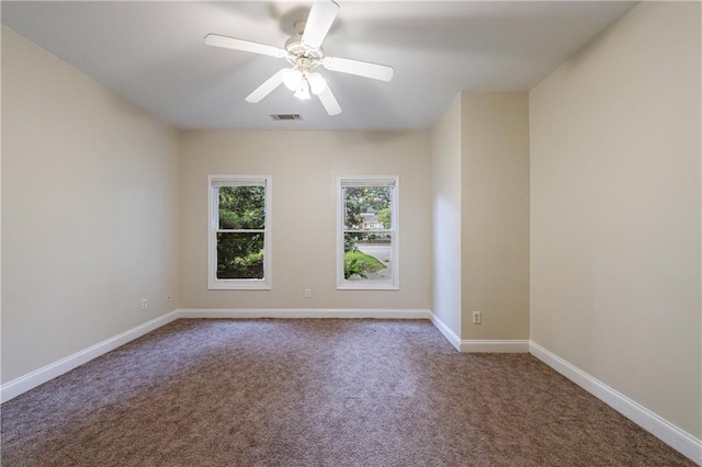 3135 Washington Rd, Atlanta, GA 30344 - carpeted empty room with baseboards and ceiling fan