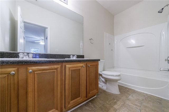 3135 Washington Rd, Atlanta, GA 30344 - full bathroom featuring double vanity, toilet, shower / bath combination, and a ceiling fan