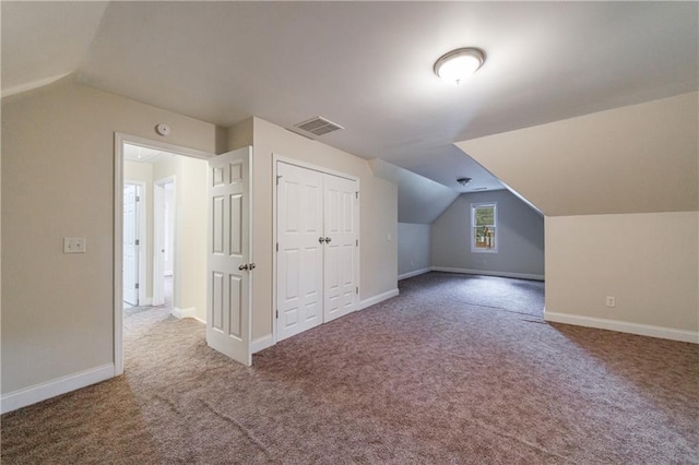3135 Washington Rd, Atlanta, GA 30344 - additional living space with lofted ceiling, carpet flooring, and baseboards